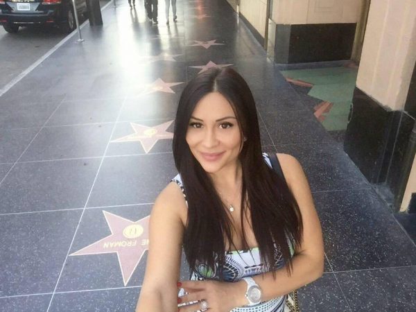 Iana Kasian, who identifies herself on Facebook as being engaged, was founded murdered on Thursday in her Holloway Drive apartment.